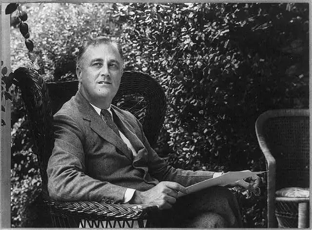 franklin-d-roosevelt-three-quarters-length-portrait-seated-on-porch-facing