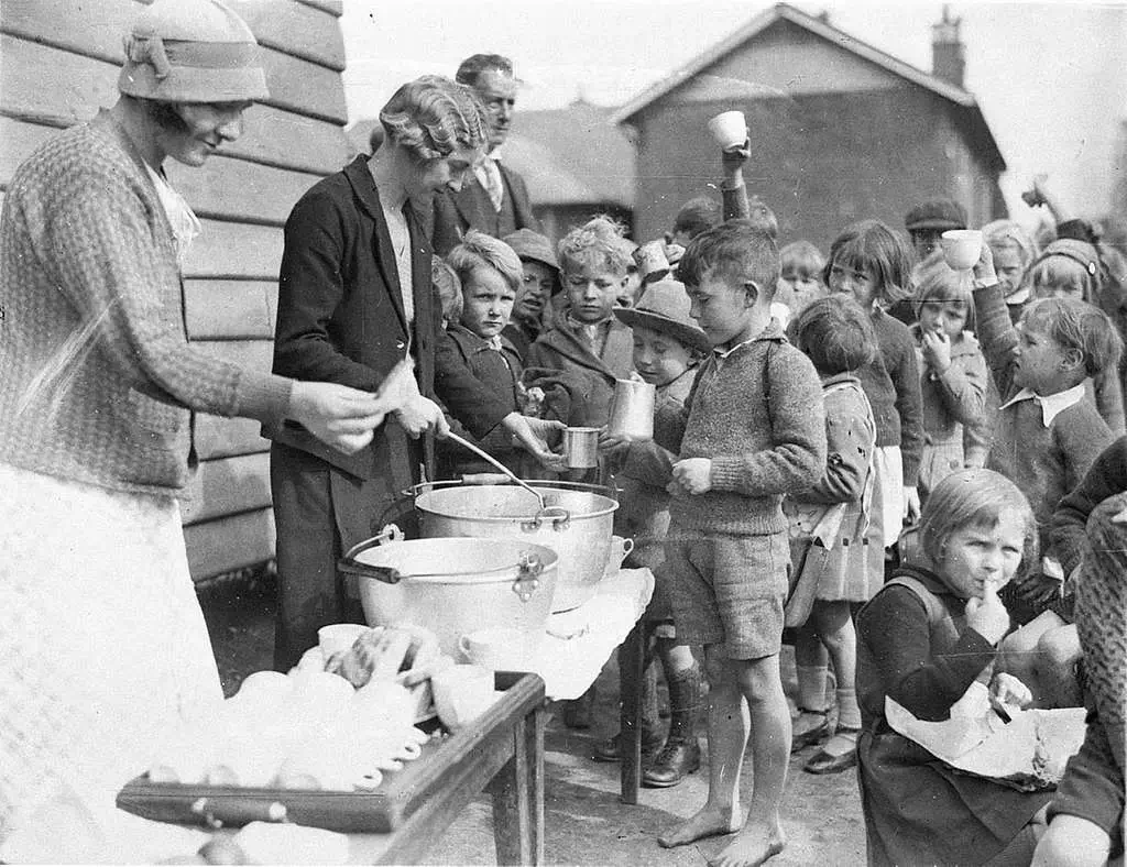 schoolchildren-line-up-for-free-issue-of-soup-and-a-slice-of-bread-in-the-depression